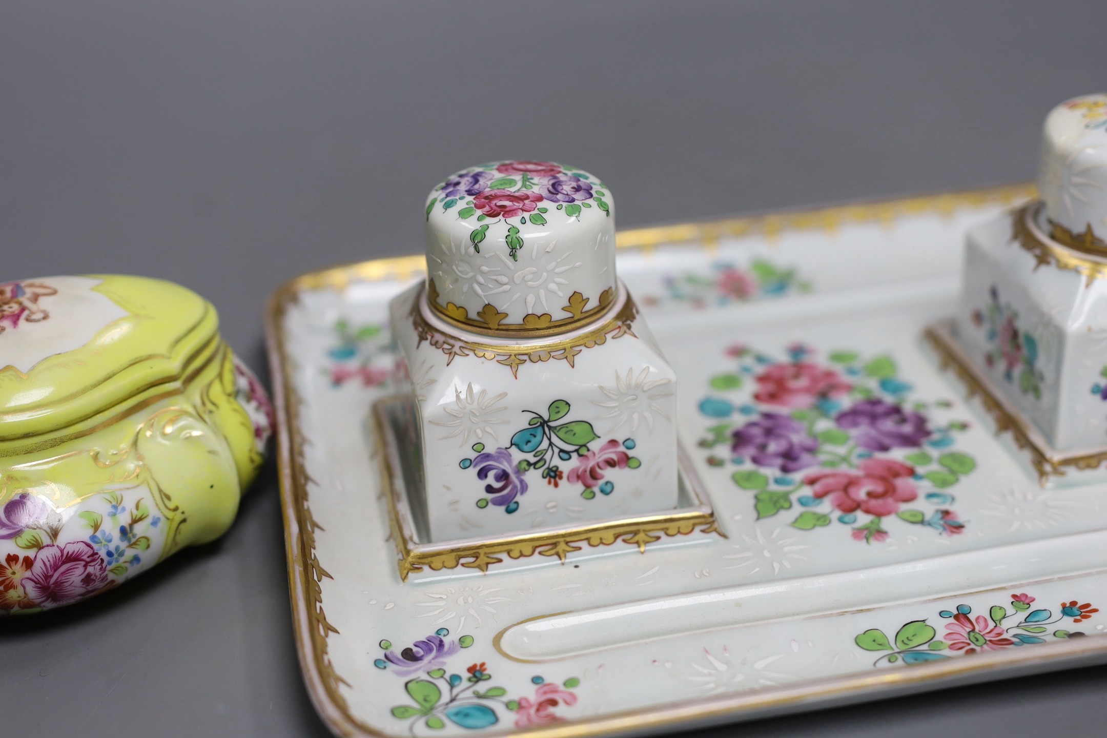 A Samson Paris inkstand and a porcelain box and cover and a porcelain model of a Scots terrier, inkstand 26cms wide